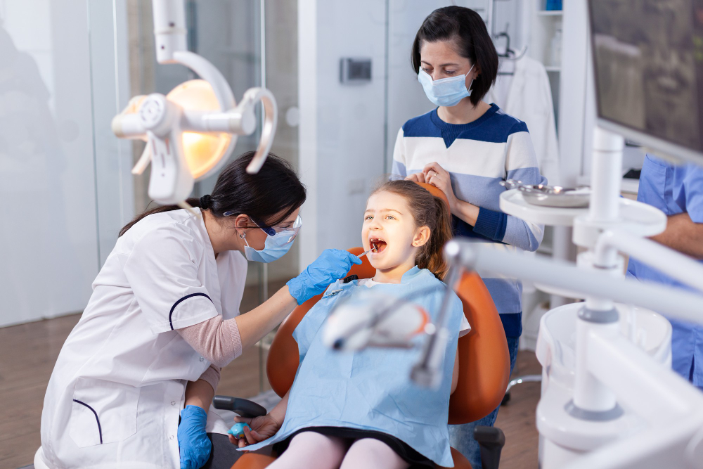 Happy family smiling after dental visit